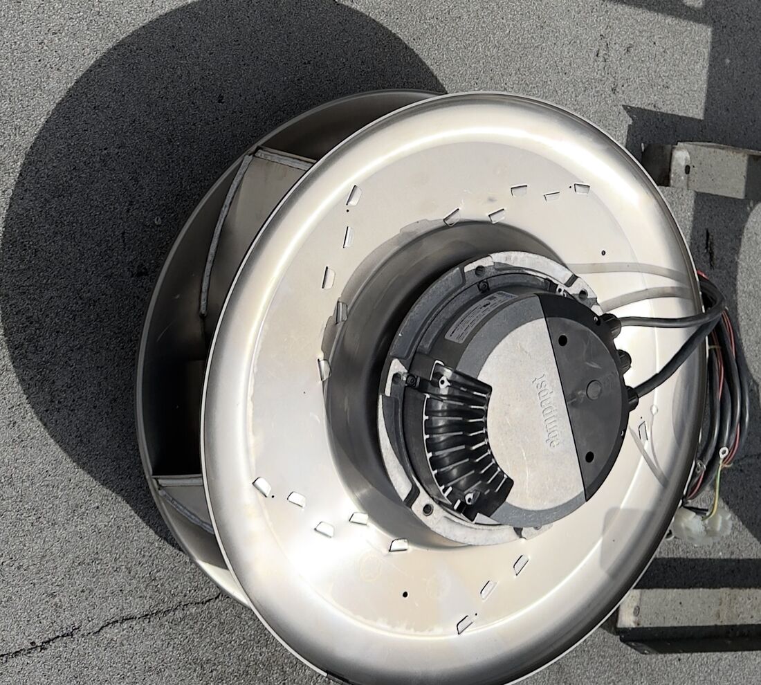 New stainless blower wheel ready to install