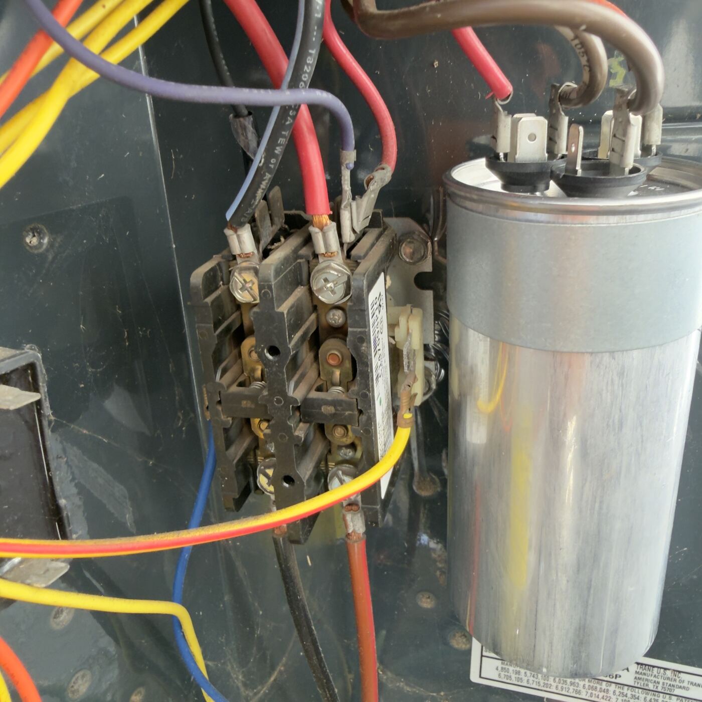 Contactor and capacitor repair inside an AC unit